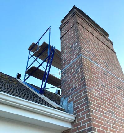 Ultimate Ridgehooks in use on a chimney restoration
